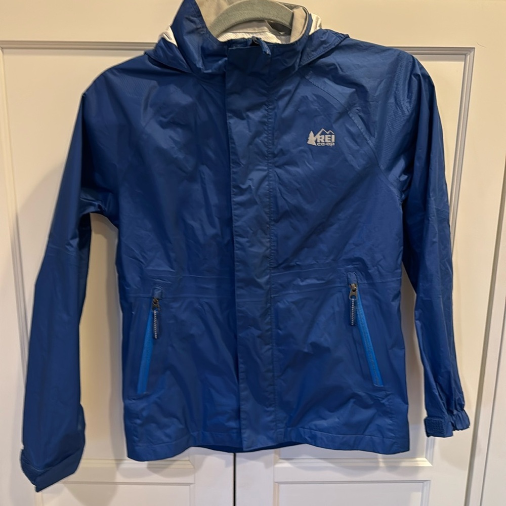 Boys/Girls Medium 10-12  REI rain jacket blue zipper hood great condition